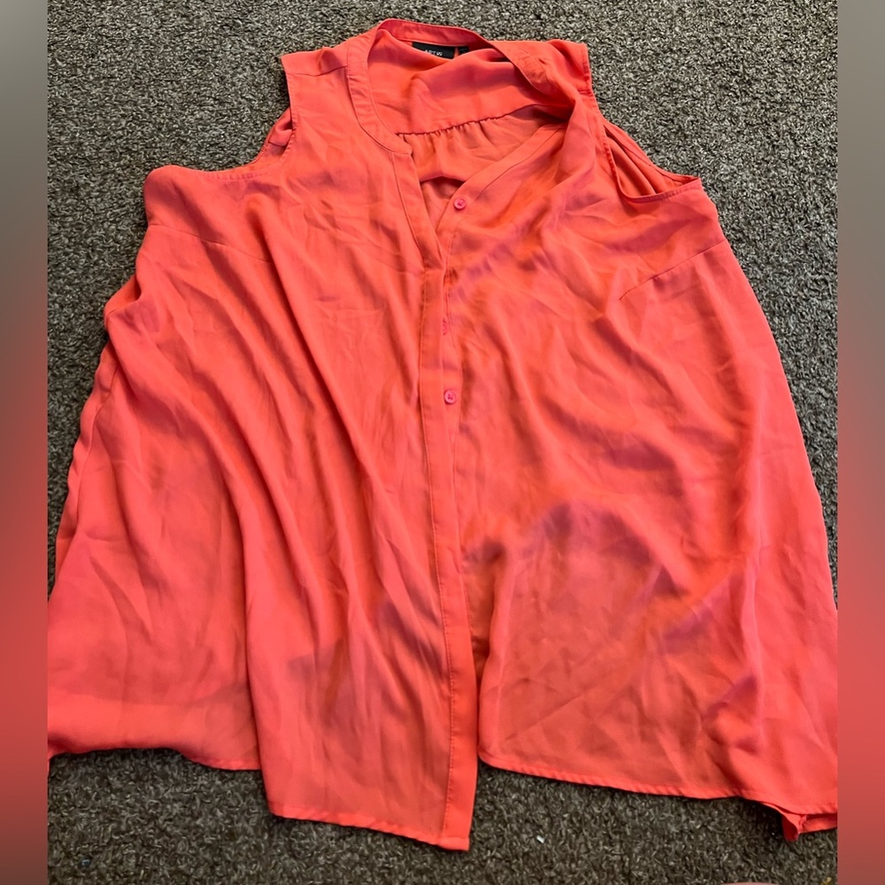 Coral colored sleeveless button down shirt
